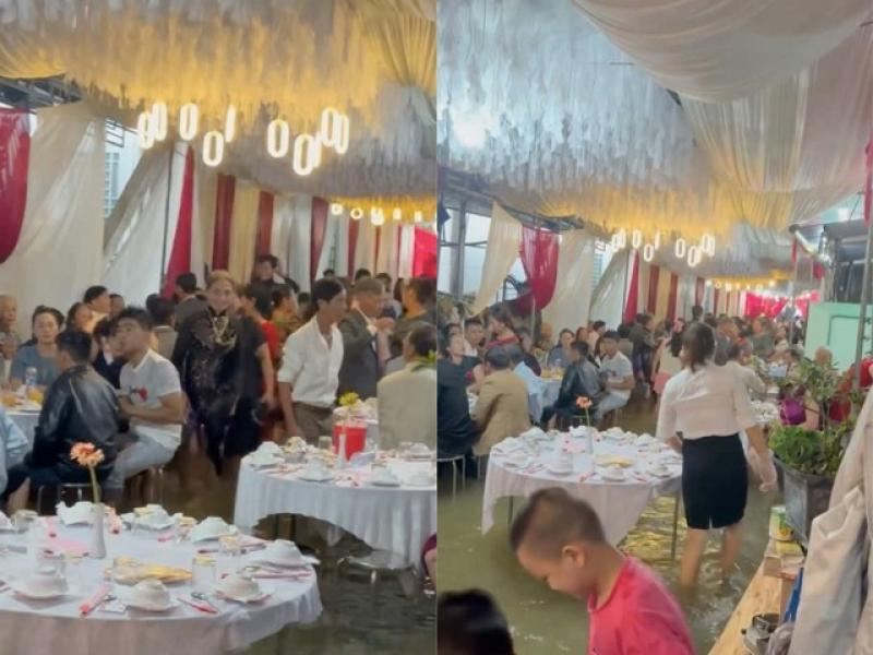Cô dâu ở Huế khóc nhìn rạp cưới ngập nước, khách mời xắn quần dự tiệc - Ảnh 2.