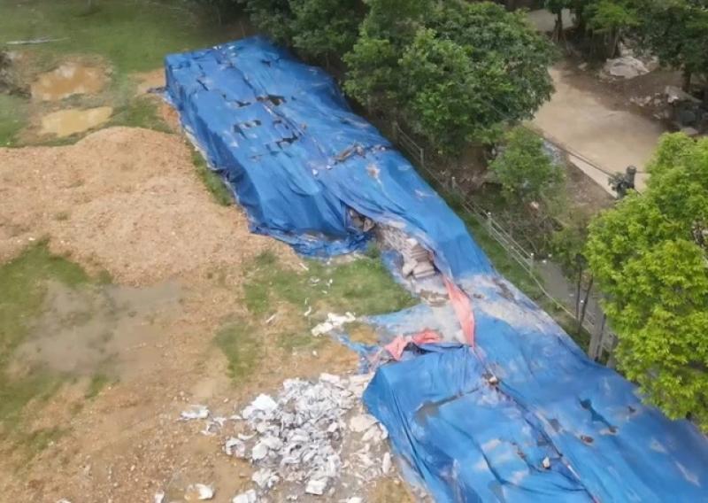 Vụ 210 tấn xi măng bị hư hỏng: Khởi tố, bắt giam chủ tịch xã - Ảnh 2.