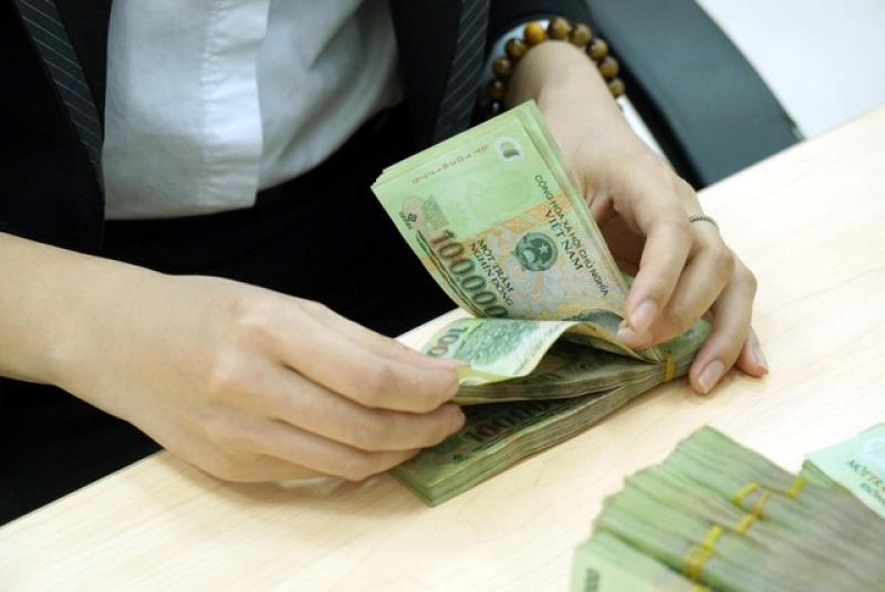 Phạt tiền lên 500 triệu đồng khi bán bảo hiểm trong cung ứng dịch vụ ngân hàng - Ảnh 1.