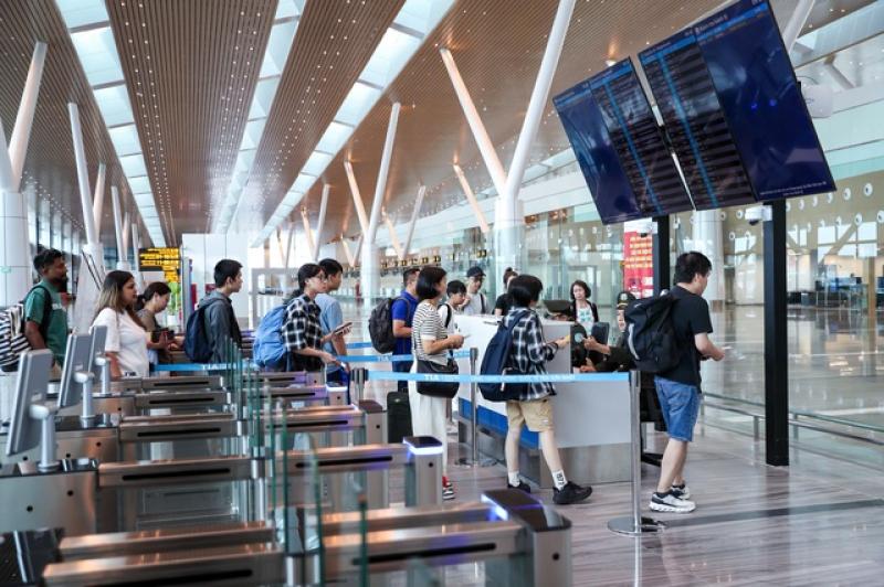 Làm thủ tục bay không giấy tờ tại nhà ga T3 - Ảnh 8.