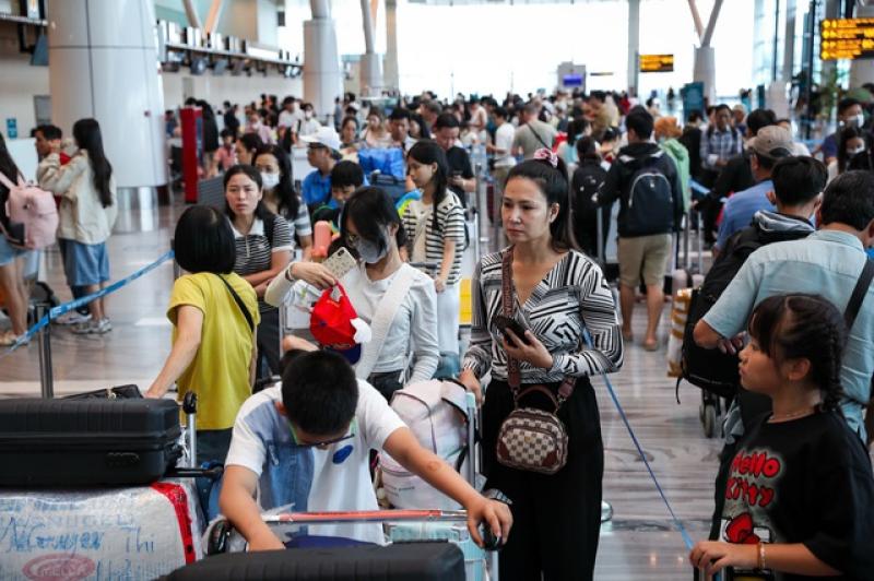 Làm thủ tục bay không giấy tờ tại nhà ga T3 - Ảnh 14.